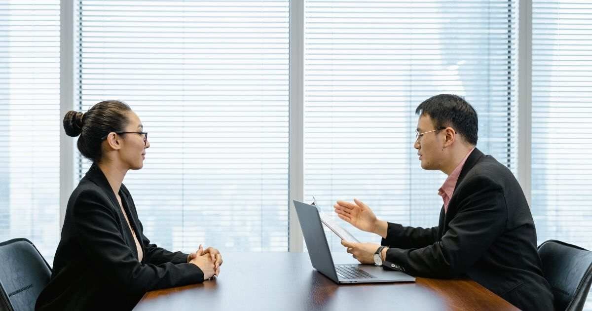 Office interview: One-on-one interview in a modern office.